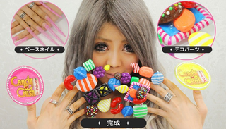Illustration for article titled Woman Uses Her Unbelievable Fingernails To Promote Candy Crush